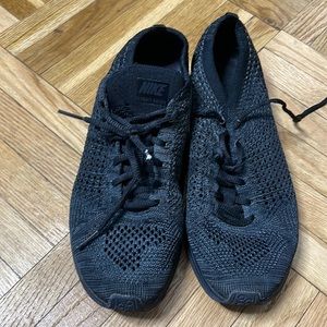 All black Nike Flyknit Racers